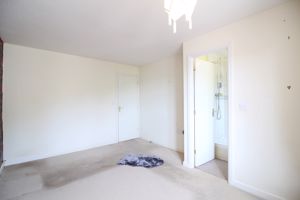 Bedroom One- click for photo gallery